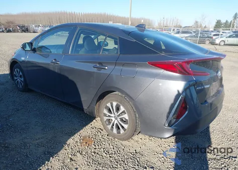 2021 Toyota Prius Prime Le z USA, uszkodzony, nr VIN JTDKAMFP0M3185706